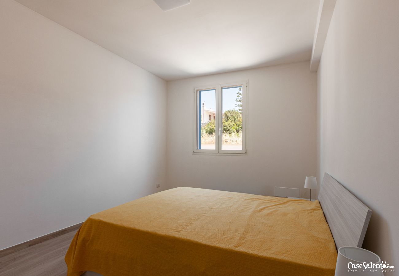 Appartamento a Pescoluse - Appartamento con grande terrazza e vista mare spiaggia di Pescoluse, m613
